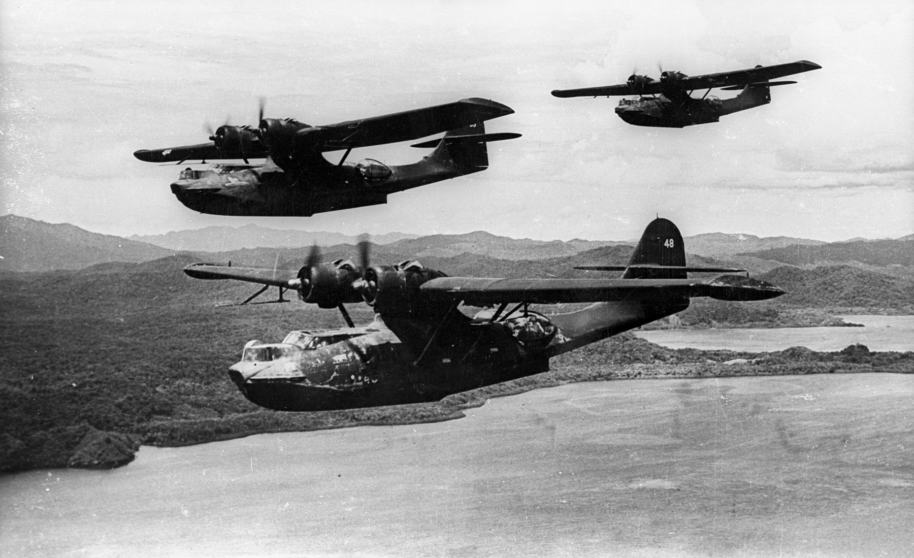 Three Consolidated PBY-5A Catalinas of patrol squadron VP-52 in the south-west Pacific in December 1943.